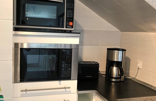 Playa del Aguila House | Beautiful bungalow with generous kitchen, sea view and beach/sea access