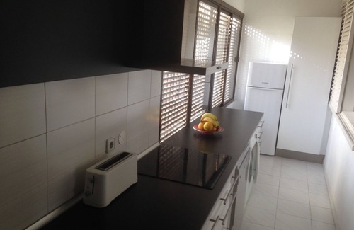 Playa del Aguila House | Beautiful bungalow with generous kitchen, sea view and beach/sea access