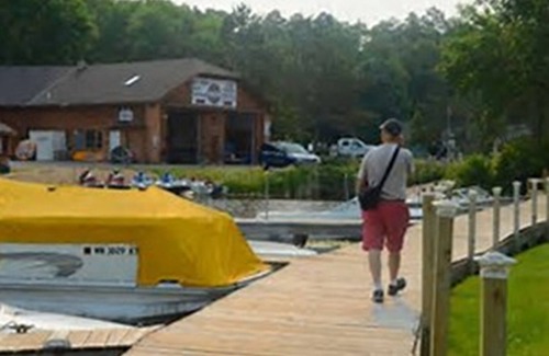 Lake Shore Resort | Beautiful cabin on Gull Lake with access to resort's indoor pool and hot tub