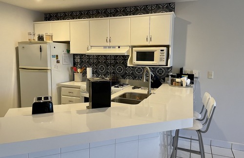 El Cid Condo | Beautiful Condo in Villa with shared pool on a private Golf Course Security 24/7