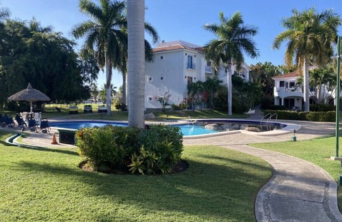 El Cid Condo | Beautiful Condo in Villa with shared pool on a private Golf Course Security 24/7