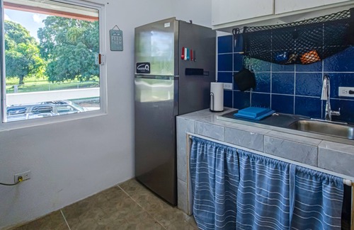 Dangriga Condo | Beautiful Condo with jungle views, splash pool partial AC & wifi