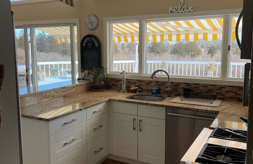 Westhampton House | Beautiful, dog-friendly 4BR home on 1.6 acres. Waterfront view and private dock.