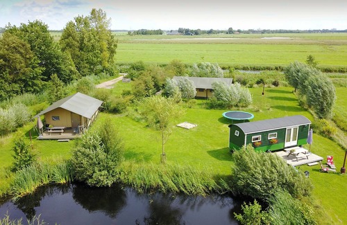 Enumatil Cabin | Beautiful furnished safaritent with private bathroom in separate building (4-p.)