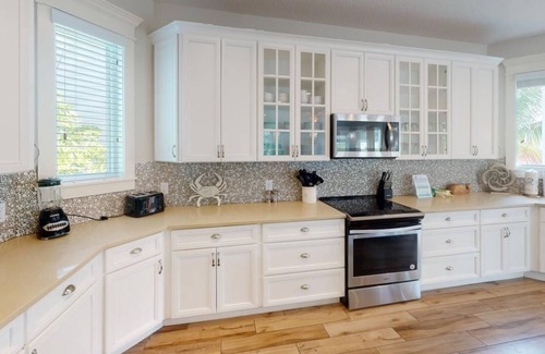 Bradenton Beach House | Beautiful Home with Pool, Waterslide and Spa! Gulf and Bay Views, Rooftop Deck -