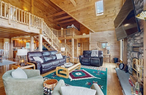 Dundee House | Beautiful lake view home with decks, grill, soaking tub & fireplace