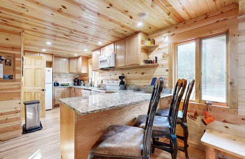 Friendship House | Beautiful lakefront log cabin with dock, firepit, washer/dryer, dog friendly
