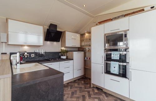 Sheerness House | Beautiful lodge - stunning sea views, dog friendly