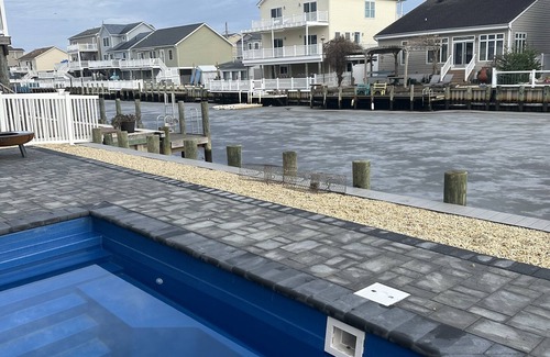 Beach Haven West House | Beautiful new home with heated pool on a lagoon