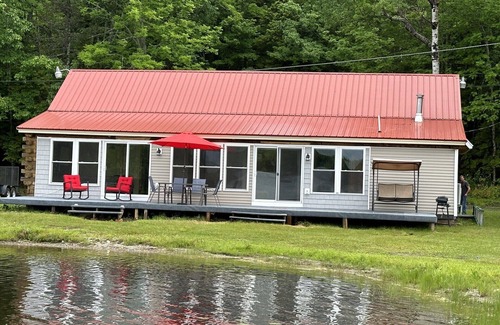 Ellsworth House | Beautiful private beach area within steps from the modern updated log home