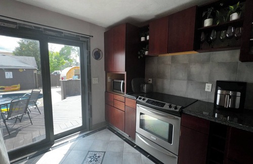 West Allis House | Beautiful private vacation home close to State Fair Park. Outdoor pool, sleeps 6