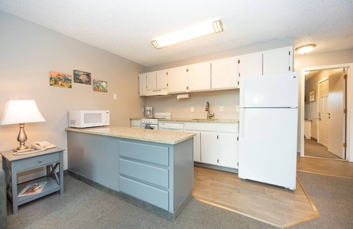 Bend Condo | Beautiful River Views - Walk Downtown ~ Fireplace ~ Patio