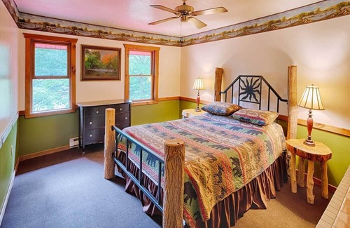 Champion Cabin | Beautiful spacious country home set on 22 acres that sleeps 27 people.