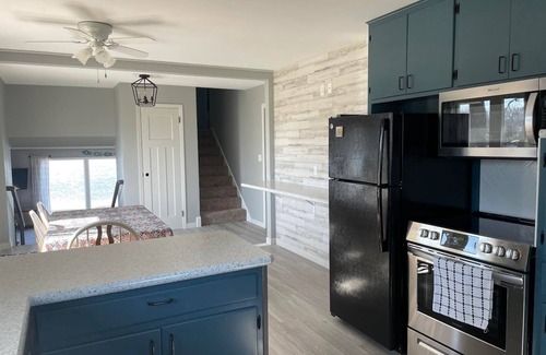 Fairmont House | Beautiful walkout lakefront property - Location, Location, Location!