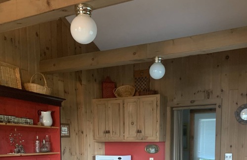 Eagle Bay Cottage | Beautiful Yellow Cottage on 4th Lake