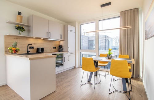 Marienleuchte Apartment | BeltBlick 24 - Roof terrace. Sea view. Sauna. Design.