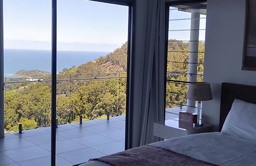 Korora House | Belvedere, cleverly designed with magnificent panoramic views from every room in the house.