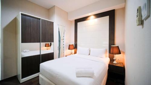 Surabaya Apartment | Best Location and Tidy 2BR Apartment at Trillium Residence By Travelio