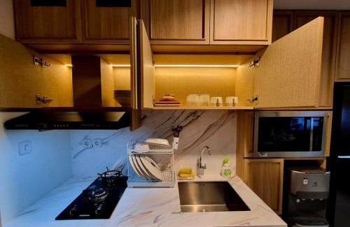 Pondok Aren Apartment | Blu Embarc 2BR Apt ByDamaresa