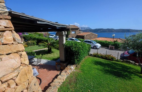 Capo Coda Cavallo Apartment | Blue Dawn - Holiday home with cozy terrace, garden & wonderful sea view.