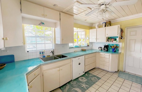 Dunmore Town House | Blue Dolphin - Waterfront, 4 Sunset Decks, Dock, 5+ Bedrooms, Enclosed Garden