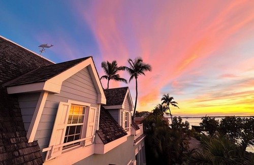 Dunmore Town House | Blue Dolphin - Waterfront, 4 Sunset Decks, Dock, 5+ Bedrooms, Enclosed Garden