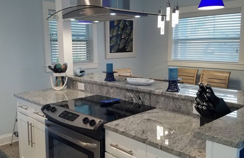 Port Canaveral House | Blue Palm Beachside Cottage Heated Pool - Only Steps from Beach