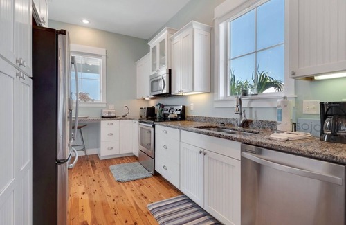 Cape San Blas House | Blue Pelican is a stunning bayfront retreat in the gated Ovation community at Cape San Blas, offering sweeping views of St. Joseph Bay and easy access to both the bay and Gulf.