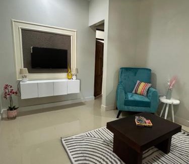 Msasani House | Blue wave loft master bedroom