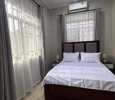 Msasani House | Blue wave loft private room
