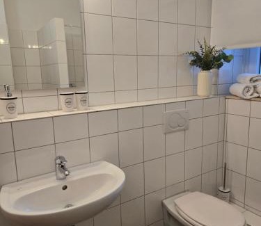 Ibbenbueren House | BOARDINGHOUSE PD25 ALTE FEUERWACHE I Unterkunft mit Einzel- und Doppelzimmer I 3min CityHospital I Monteure I Smart TV I Einzelbetten I Küche I Gemeinschaftsraum I Wasch I P