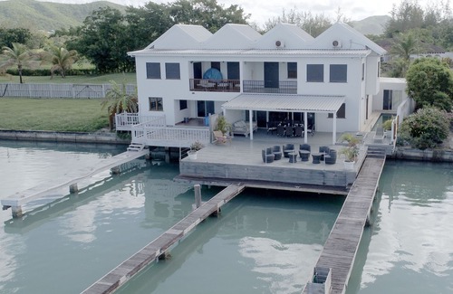 Jolly Harbour House | Boat house & KDOCK with pool & Docks 14% ST ,Usd 5 Tl PP on arrival .