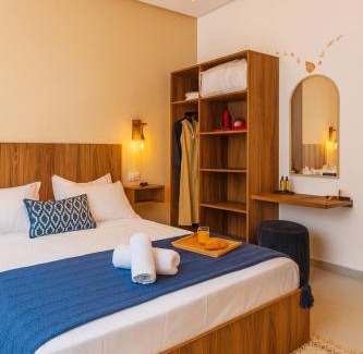 Imi Ouaddar Apartment | Boho Chic At Imi Waves Villa with walk to beach & Workspace fast wifi & AC