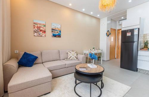 Imi Ouaddar Apartment | Boho Chic At Imi Waves Villa with walk to beach & Workspace fast wifi & AC