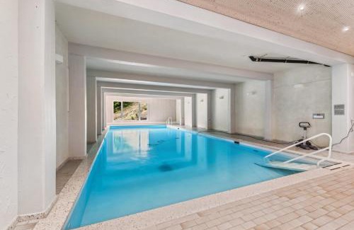 Arosa Apartment | book2stay - Kuscheliges Alpin-Studio mit Schwimmbad