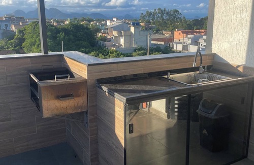 Rio das Ostras Apartment | Cozy penthouse apartment facing Rio das Ostras beach