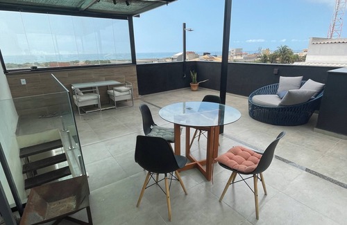 Rio das Ostras Apartment | Cozy penthouse apartment facing Rio das Ostras beach