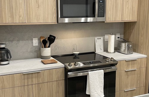 Grace Bay Condo | Brand New, Luxury Top Floor Condo w/Den