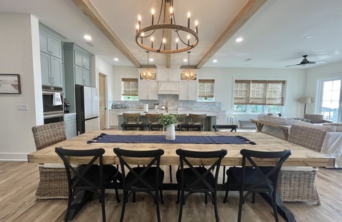 Gulf Breeze House | BREATHTAKING Waterfront Home with private dock and sunset vistas sleeps up to 24