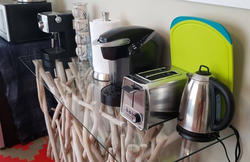 Jacksonville Beach Condo | Breezy Retreat!Walk to Beach!Bikes!Near Mayo too!