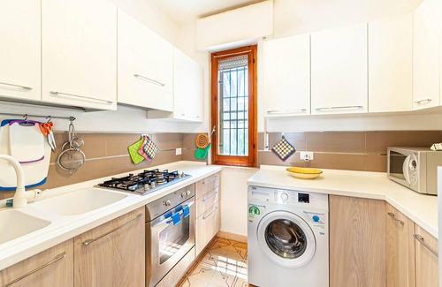 Centro Commerciale Apartment | Bright apartment with shared outdoor pool, just a few steps from the sandy beach.