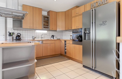 Domdidier House | Bright architect-designed villa with private garden