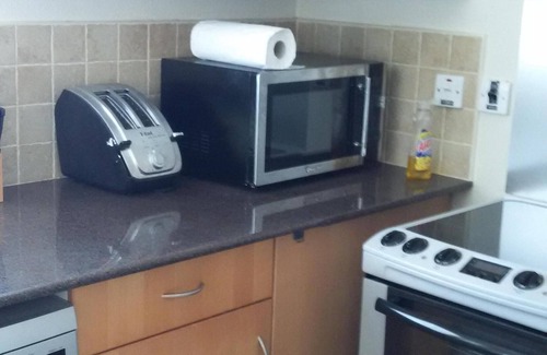 Blue Waters Apartment | Bright, Breezy Cozy Studio Apt#10 with pool on South Coast of Beautiful Barbados