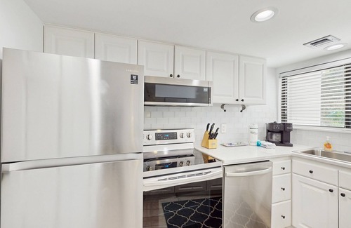 Hilton Head Condo | Bright condo with shared pools, walk to beach and short distance from Coligny