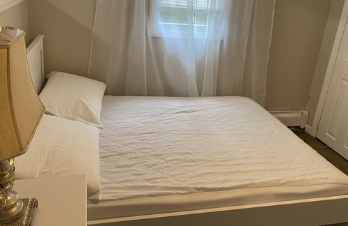 Long Beach Cottage | Bright Cottage Apartment walking distance to the beach.