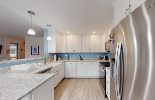 Warren Condo | Bright, mountain escape with pool, hot tub, fireplace, modern kitchen & balcony