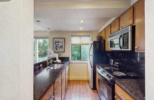 Vail House | Bright mtn-view condo with hot tub, game room, pool, balcony, grill, fireplace