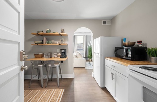 Lake Geneva Apartment | Broad Street Suite 1 |Parking Available |Downton |Walkable |Above Restaurant | King & Queen Bedroom