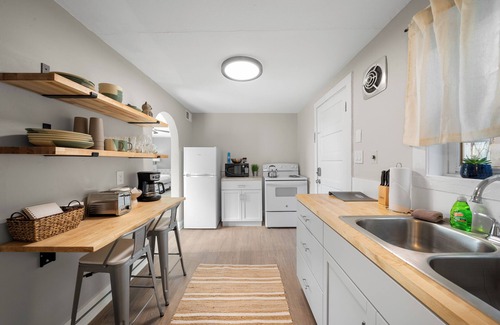 Lake Geneva Apartment | Broad Street Suite 1 |Parking Available |Downton |Walkable |Above Restaurant | King & Queen Bedroom