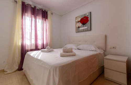 Gran Alacant House | Bungalow en Gran Alacant con Terraza y piscina comunitaria